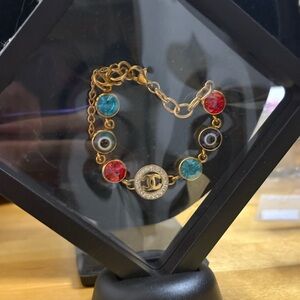 Chic Gold Bracelet with Red and Blue Accents